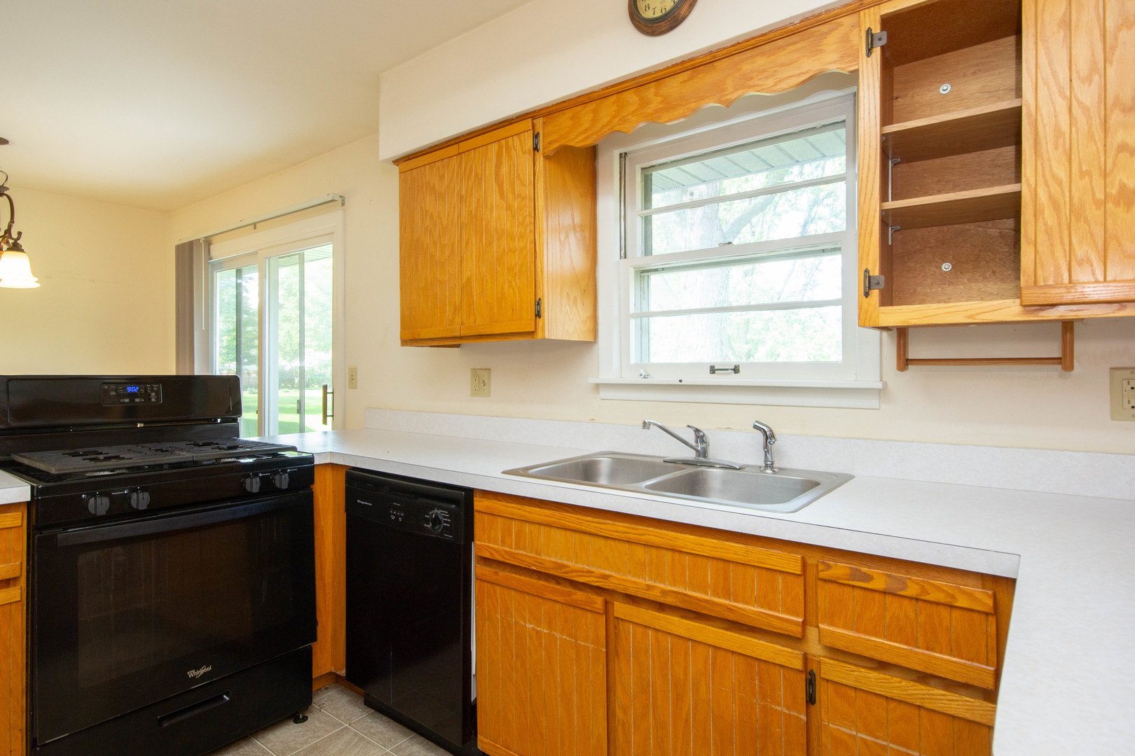24116 South Frontage Road West Channahon, IL 60410 - Photo 4 of 15 a kitchen with granite countertop cabinets sink and window