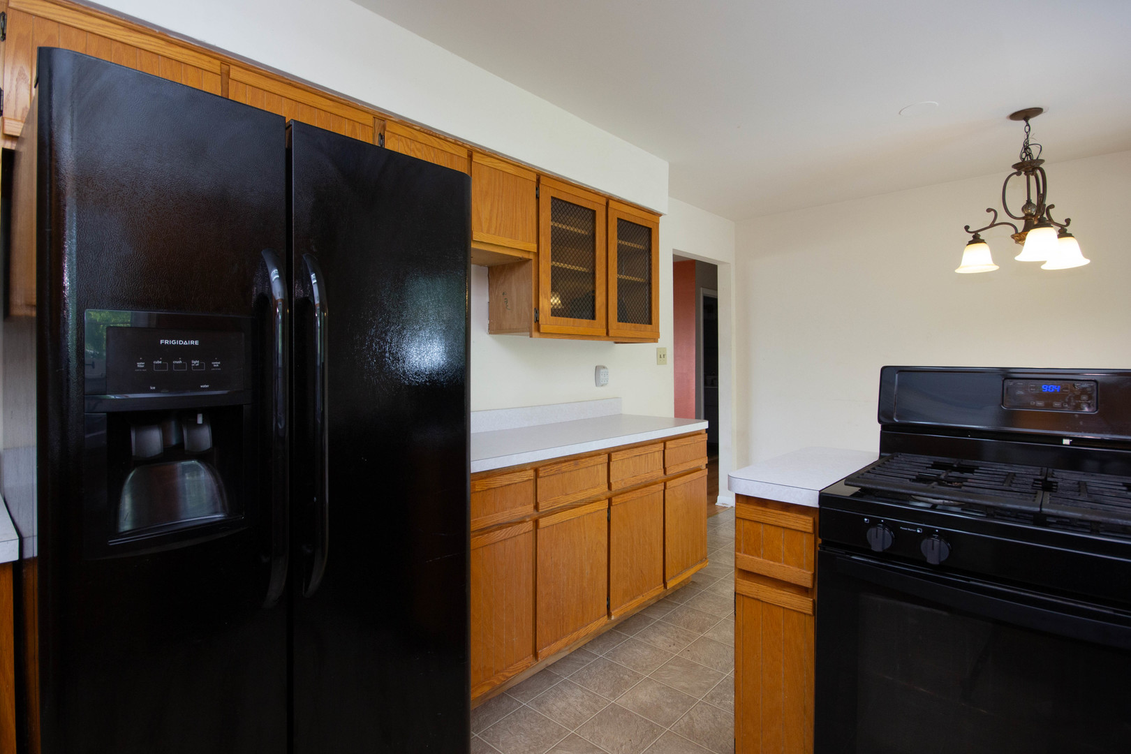 24116 South Frontage Road West Channahon, IL 60410 - Photo 5 of 15 a kitchen with stainless steel appliances granite countertop a refrigerator and a stove top oven