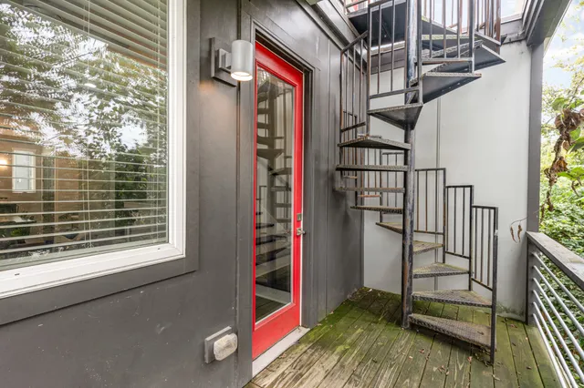 a outdoor living space with furniture and a fireplace