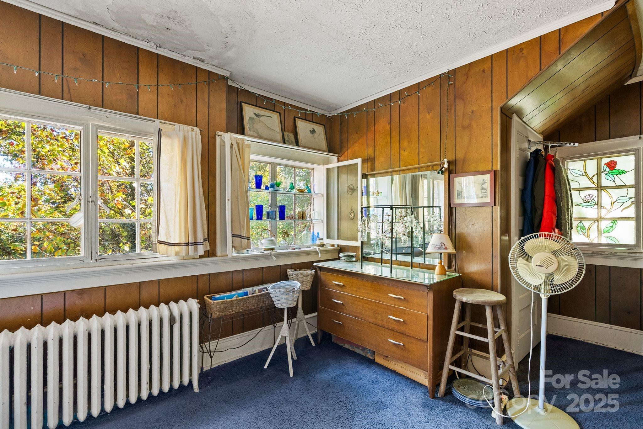 414 Beaucatcher Road Asheville, NC 28805 - Photo 19 of 34 a very nice looking room with a large window