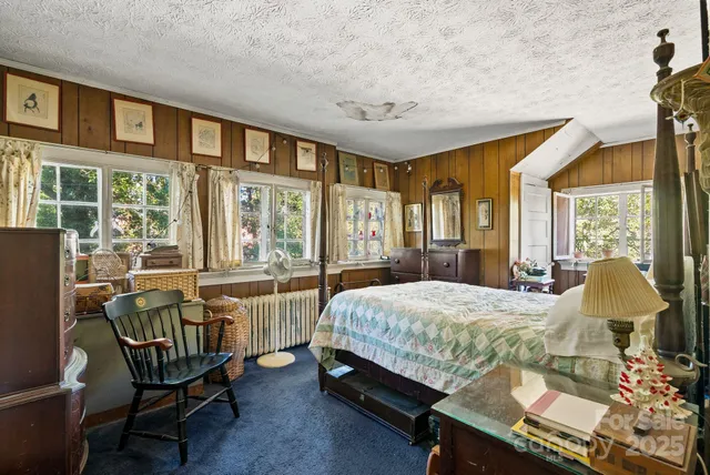 a view of a balcony dining table and chairs