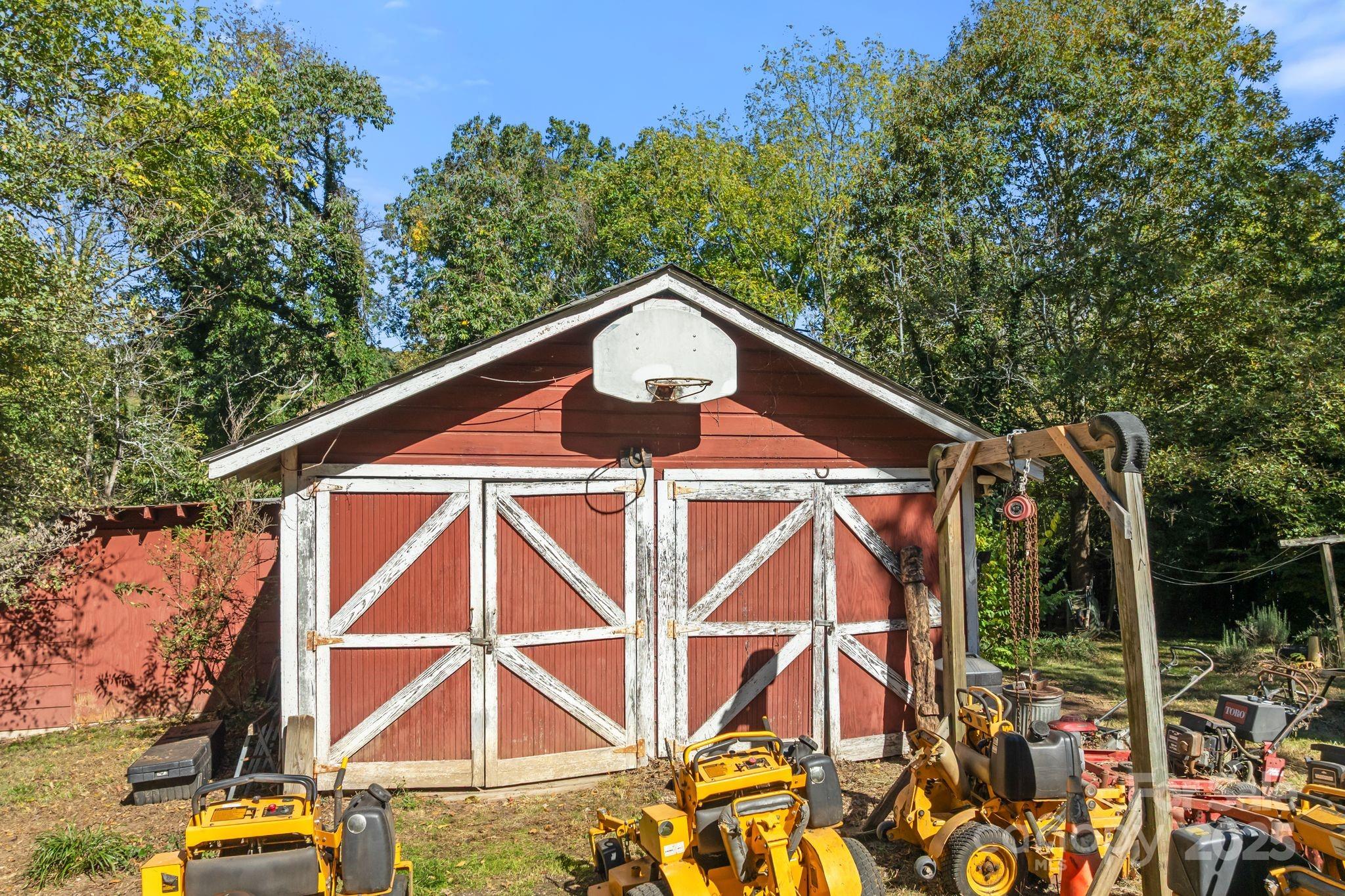 414 Beaucatcher Road Asheville, NC 28805 - Photo 26 of 34 a front view of a house with a yard