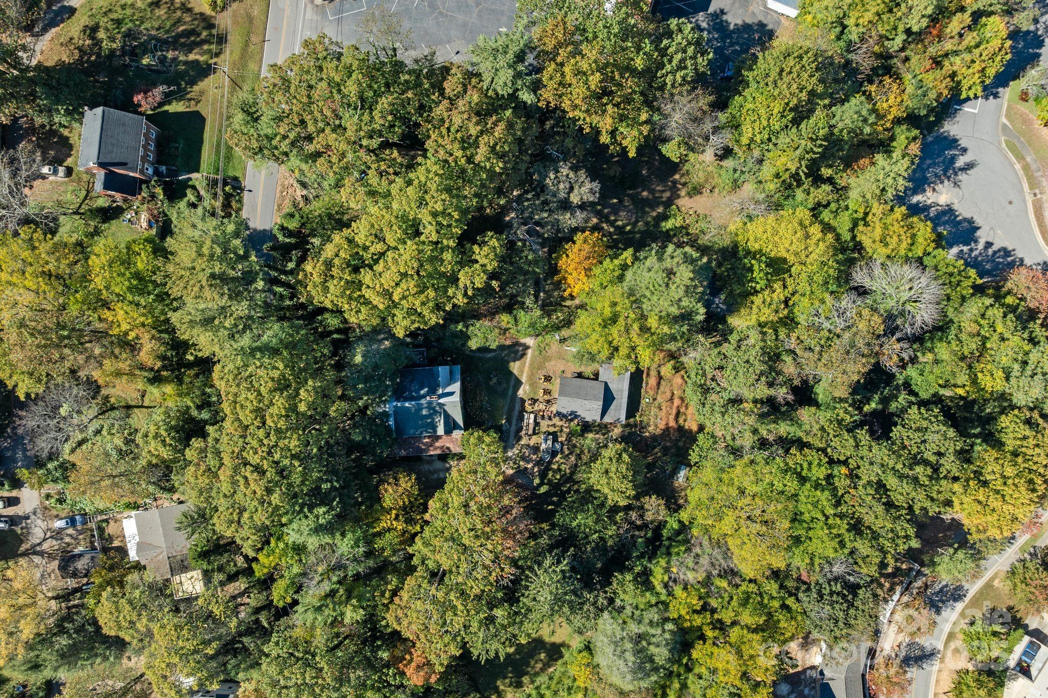 414 Beaucatcher Road Asheville, NC 28805 - Photo 27 of 34 an aerial view of a house with a yard