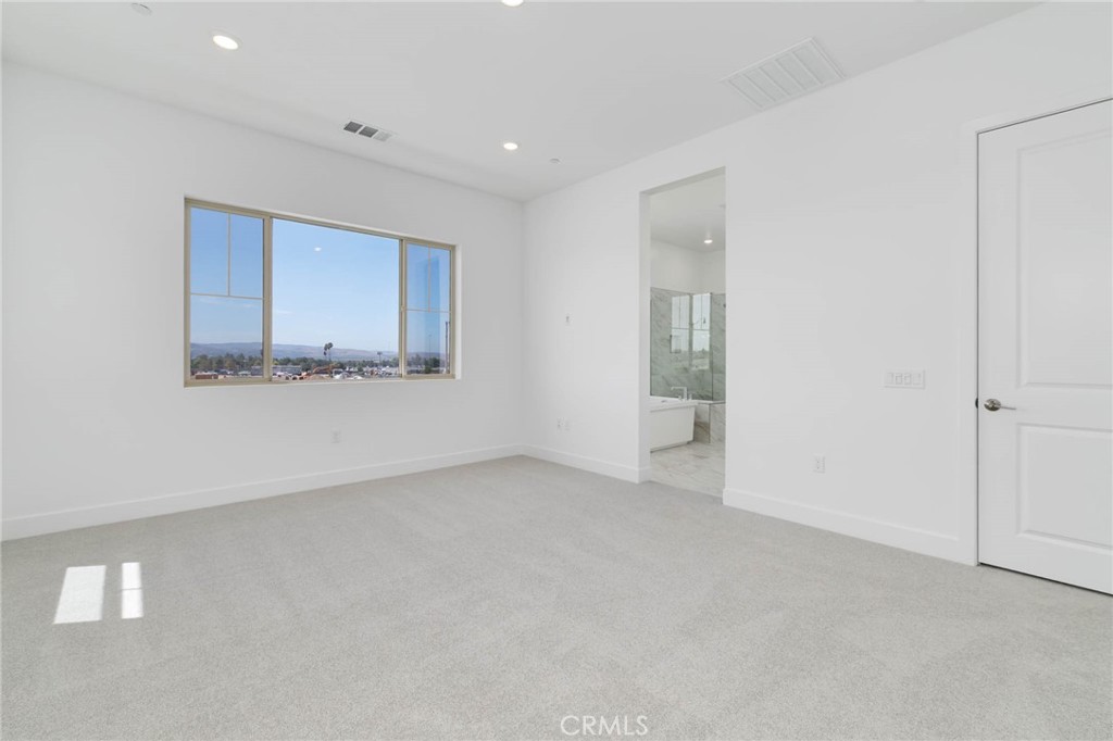 208 Lily Loop Irvine, CA 92618 - Photo 11 of 23 an empty room with a bathroom