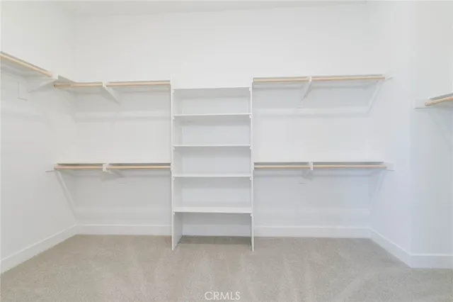 a view of an empty walk in closet