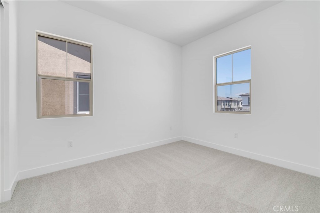 208 Lily Loop Irvine, CA 92618 - Photo 15 of 23 an empty room with a window