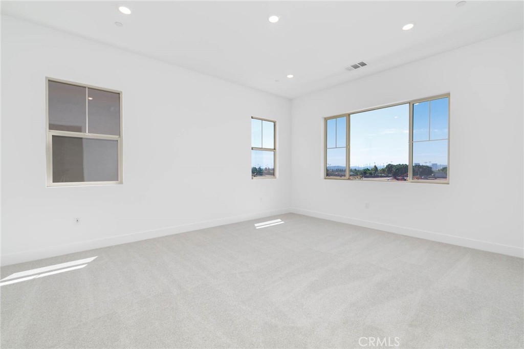 208 Lily Loop Irvine, CA 92618 - Photo 10 of 23 an empty room with a window