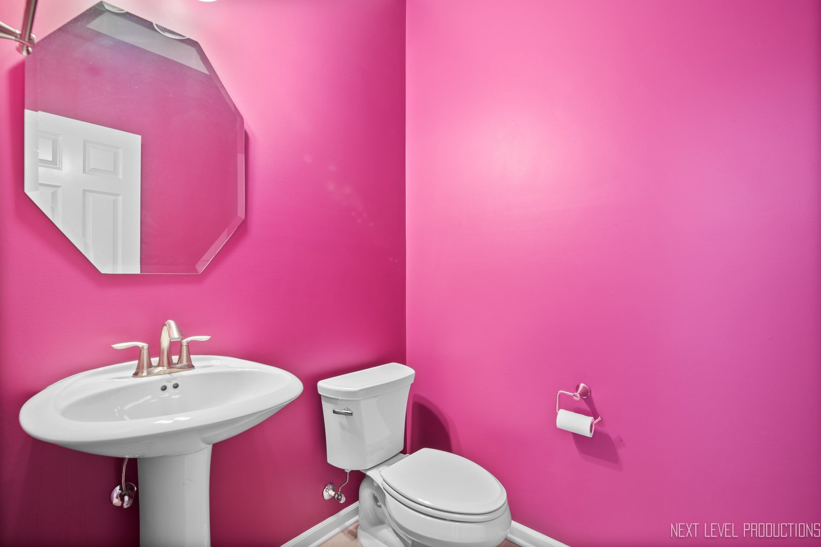 2842 Church Road Aurora, IL 60502 - Photo 23 of 28 a bathroom with a sink a toilet and mirror