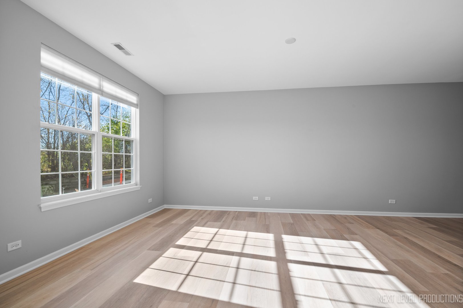 2842 Church Road Aurora, IL 60502 - Photo 5 of 28 a view of an empty room and window