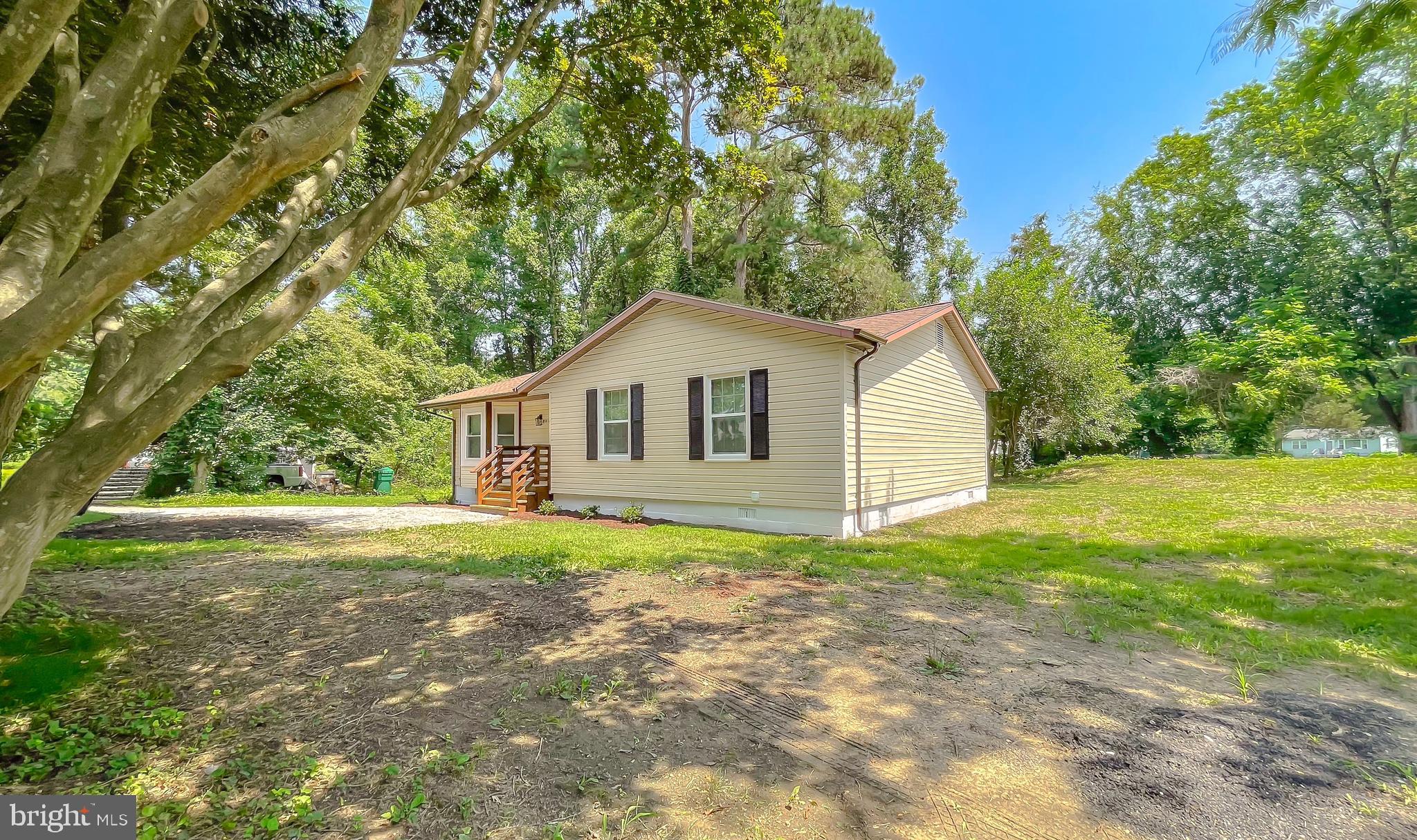 29810 Washington Road Mechanicsville, MD 20659 - Photo 2 of 44 a view of a house with yard and tree s