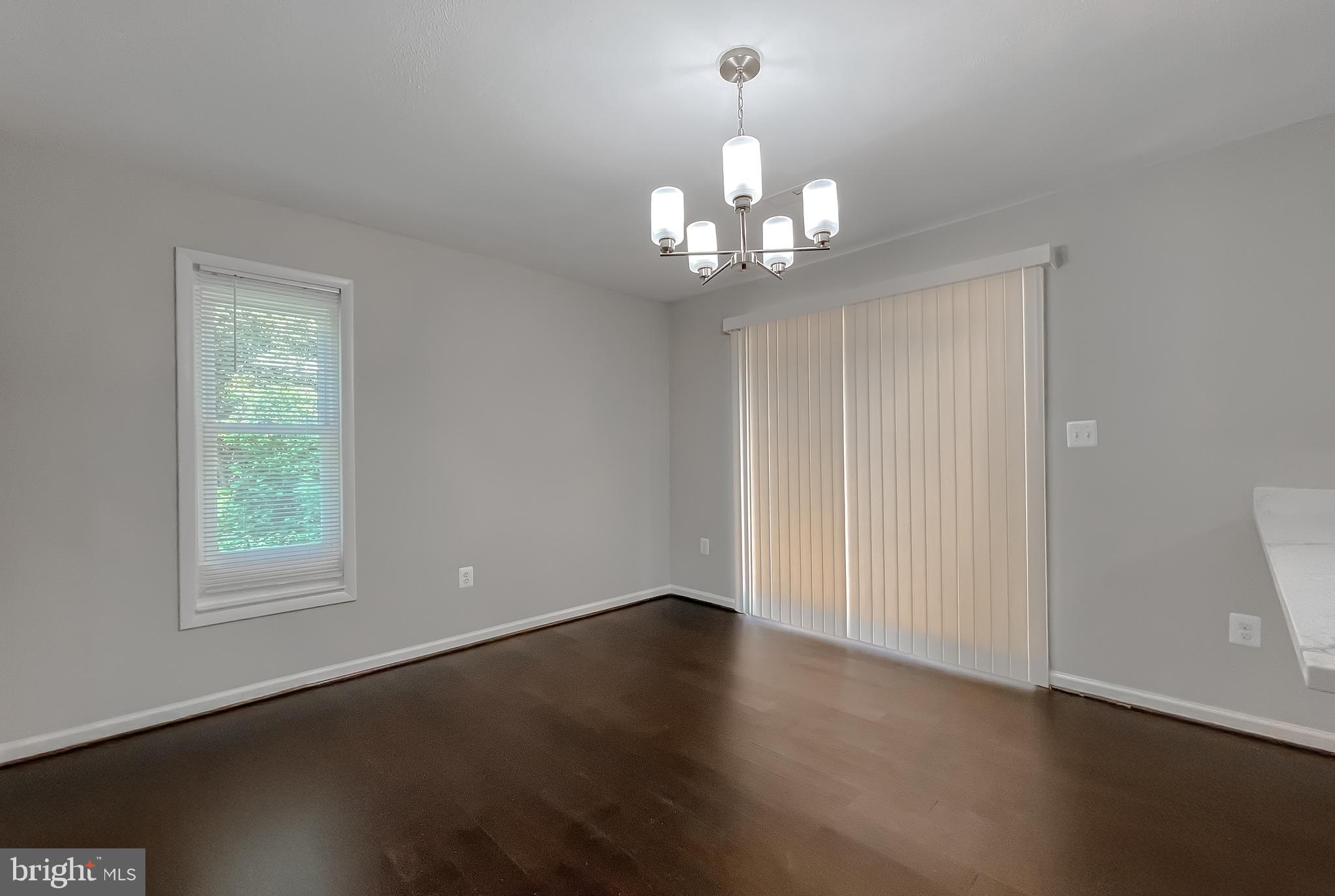 29810 Washington Road Mechanicsville, MD 20659 - Photo 24 of 44 a view of empty room with wooden floor and window