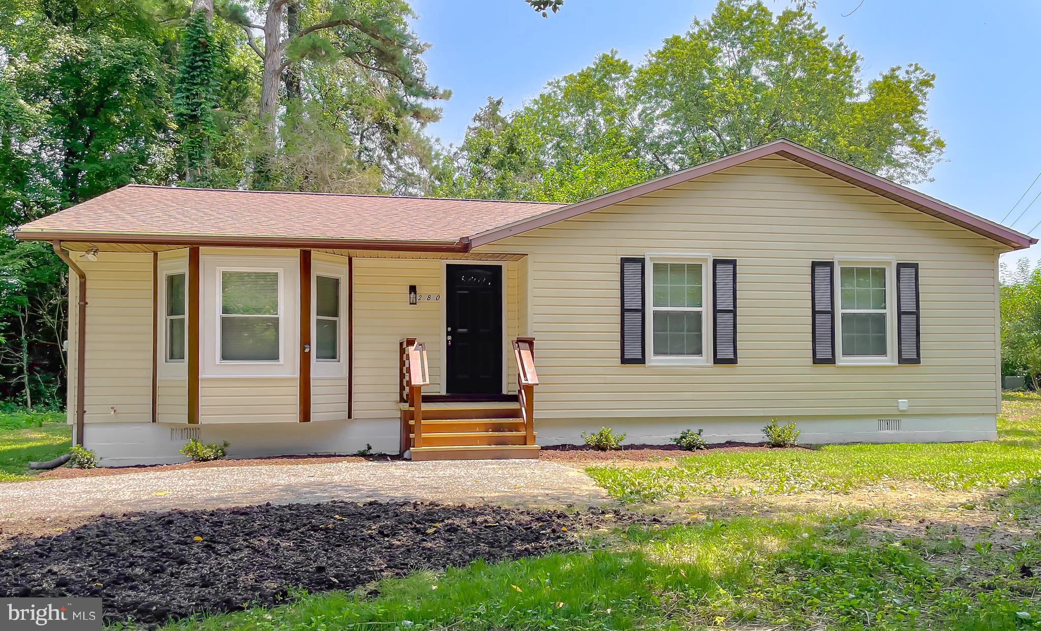 29810 Washington Road Mechanicsville, MD 20659 - Photo 3 of 44 a view of a house with yard