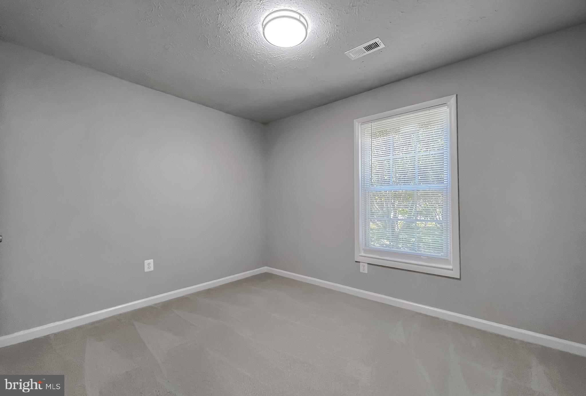 29810 Washington Road Mechanicsville, MD 20659 - Photo 33 of 44 an empty room with a window
