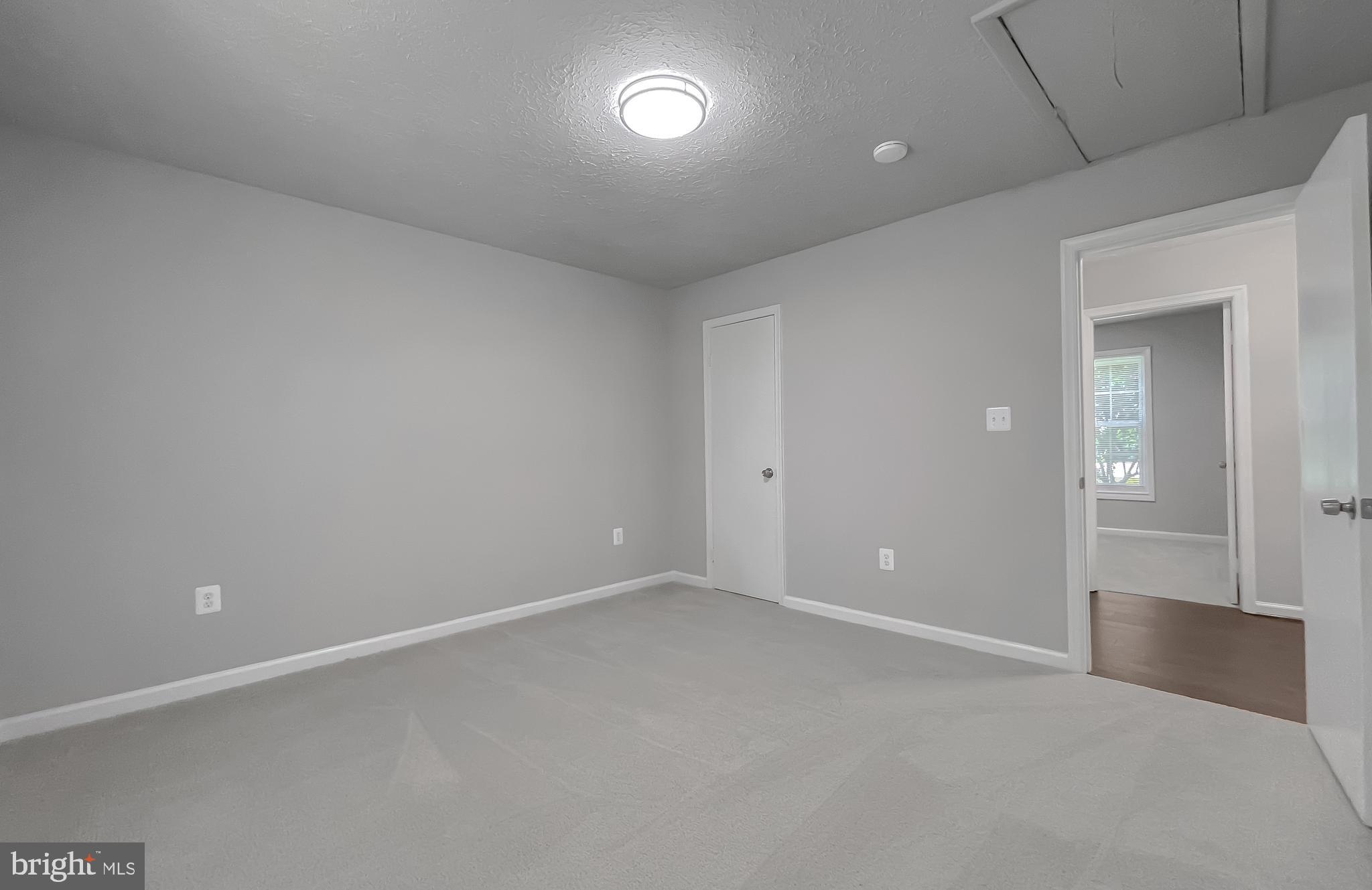 29810 Washington Road Mechanicsville, MD 20659 - Photo 40 of 44 an empty room with a fan