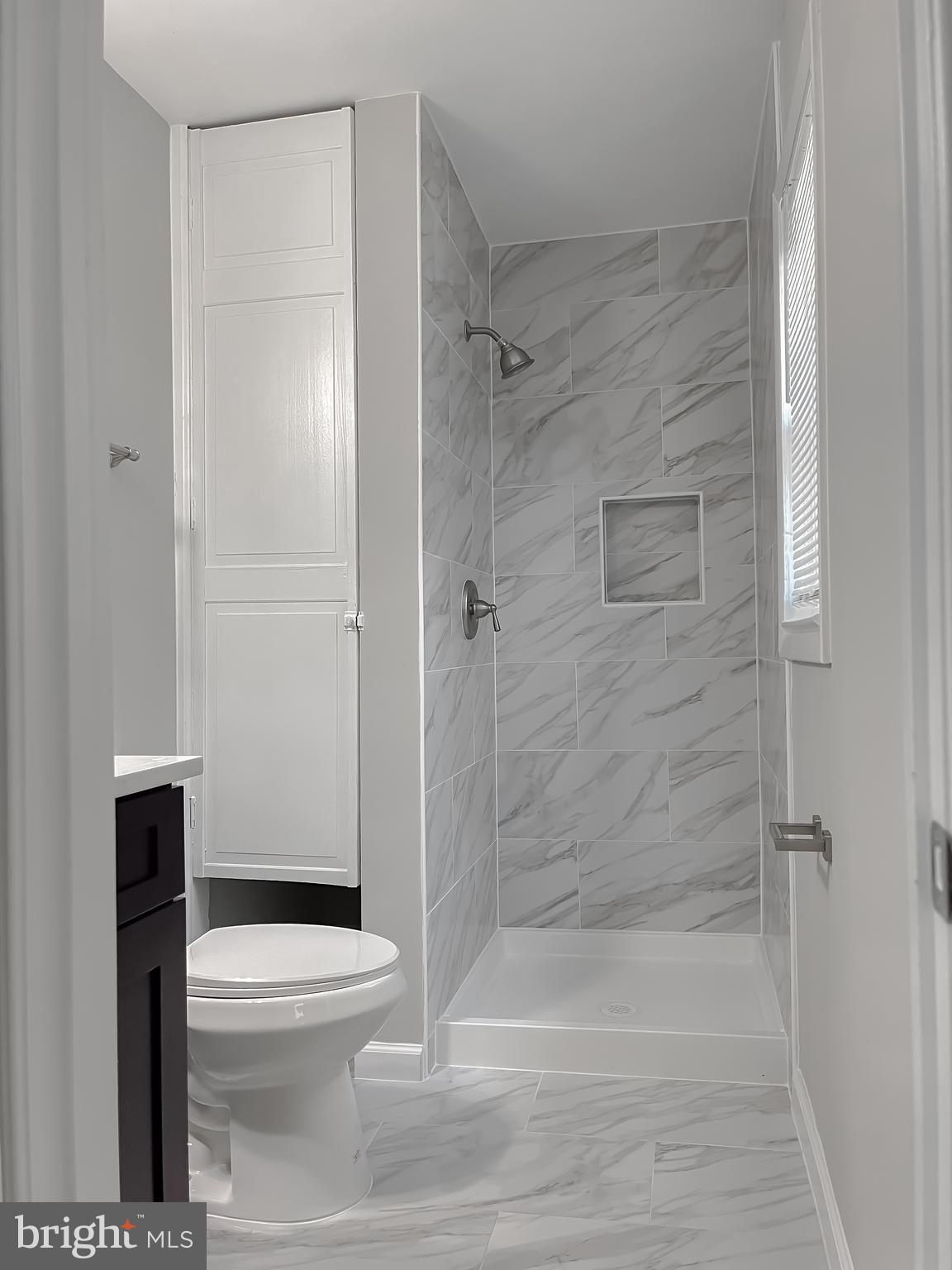 29810 Washington Road Mechanicsville, MD 20659 - Photo 41 of 44 a bathroom with a toilet and a shower