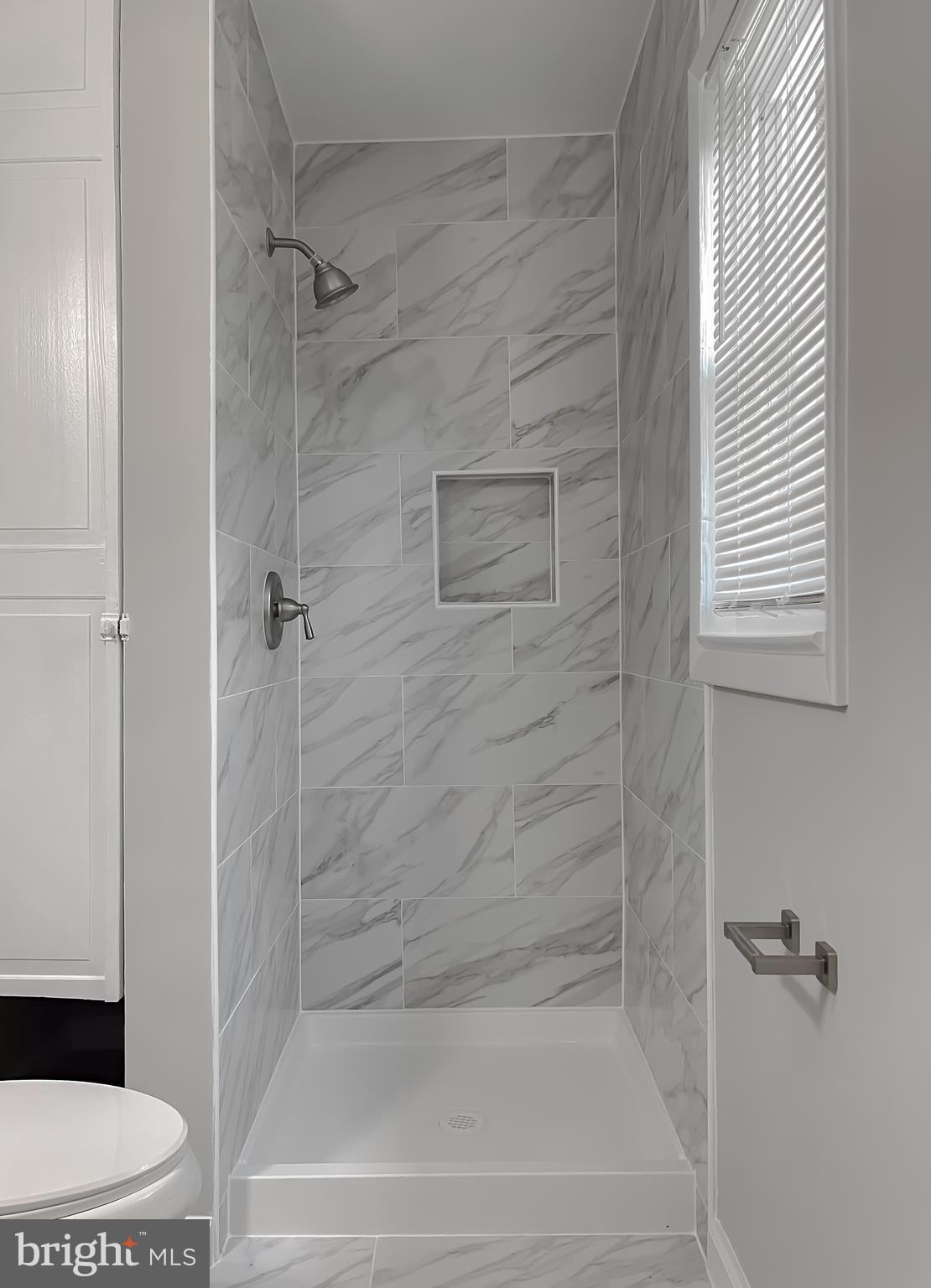 29810 Washington Road Mechanicsville, MD 20659 - Photo 42 of 44 a bathroom with a bathtub and a toilet