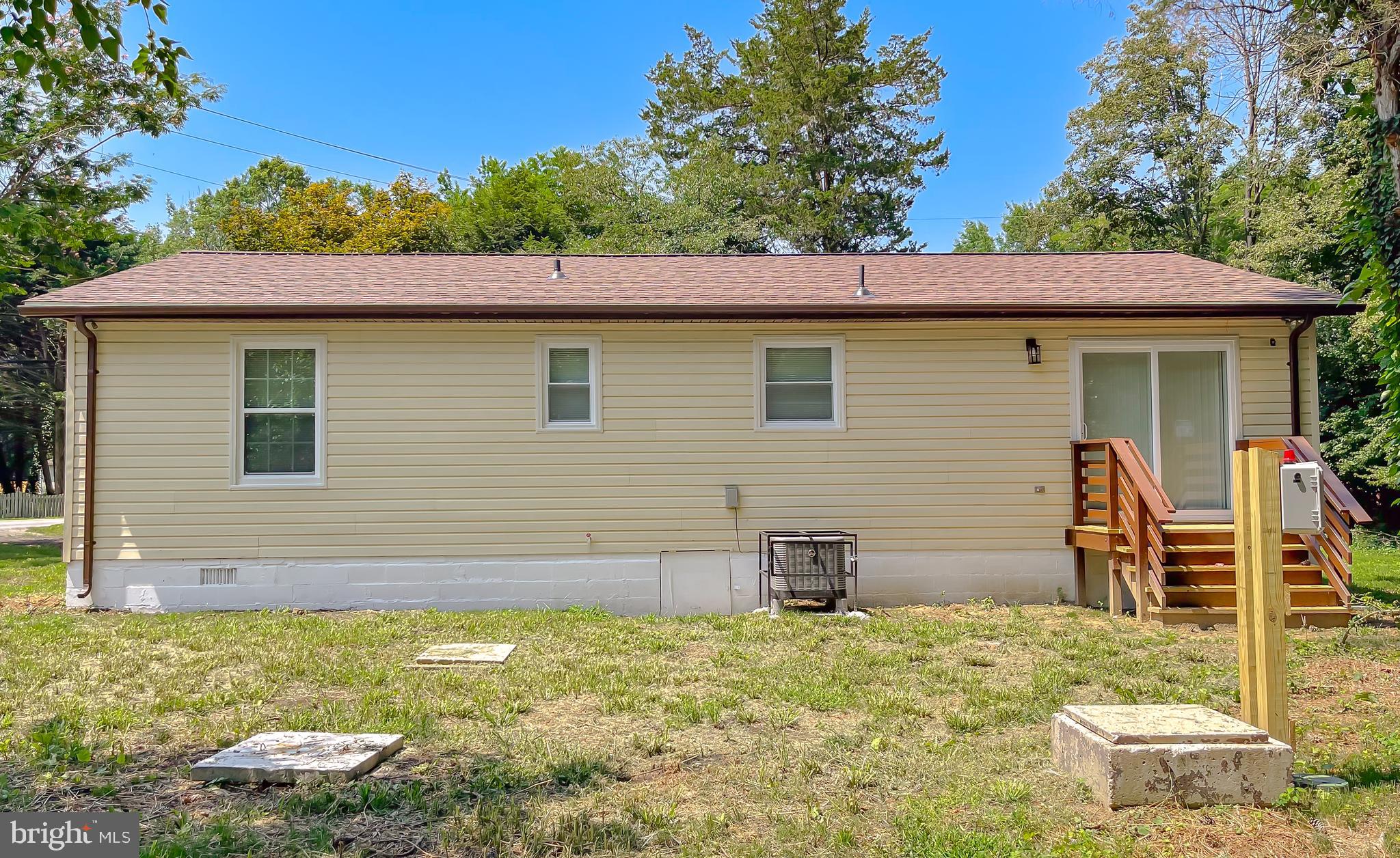 29810 Washington Road Mechanicsville, MD 20659 - Photo 5 of 44 a view of a house with a yard