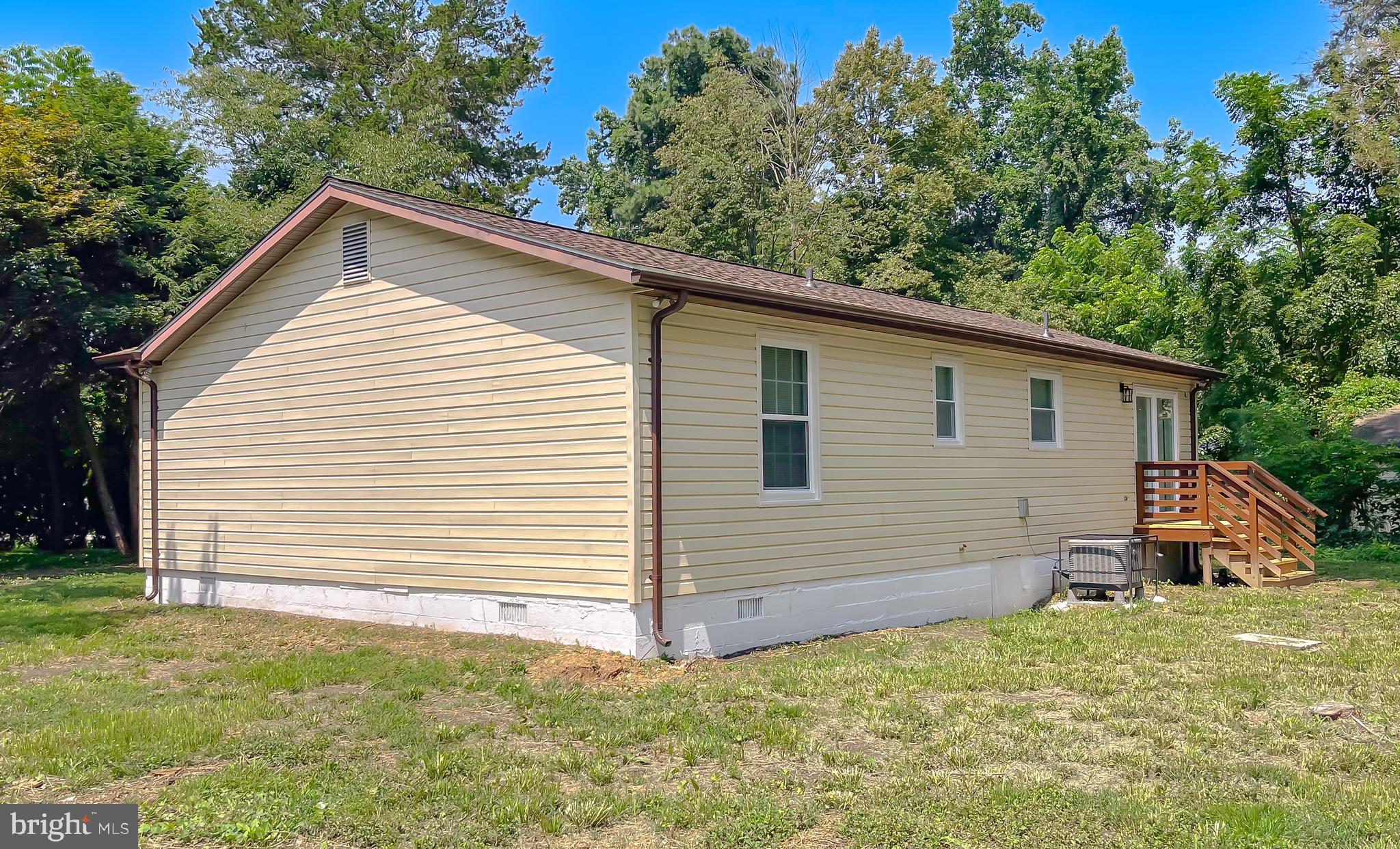 29810 Washington Road Mechanicsville, MD 20659 - Photo 6 of 44 a view of a backyard with a garden