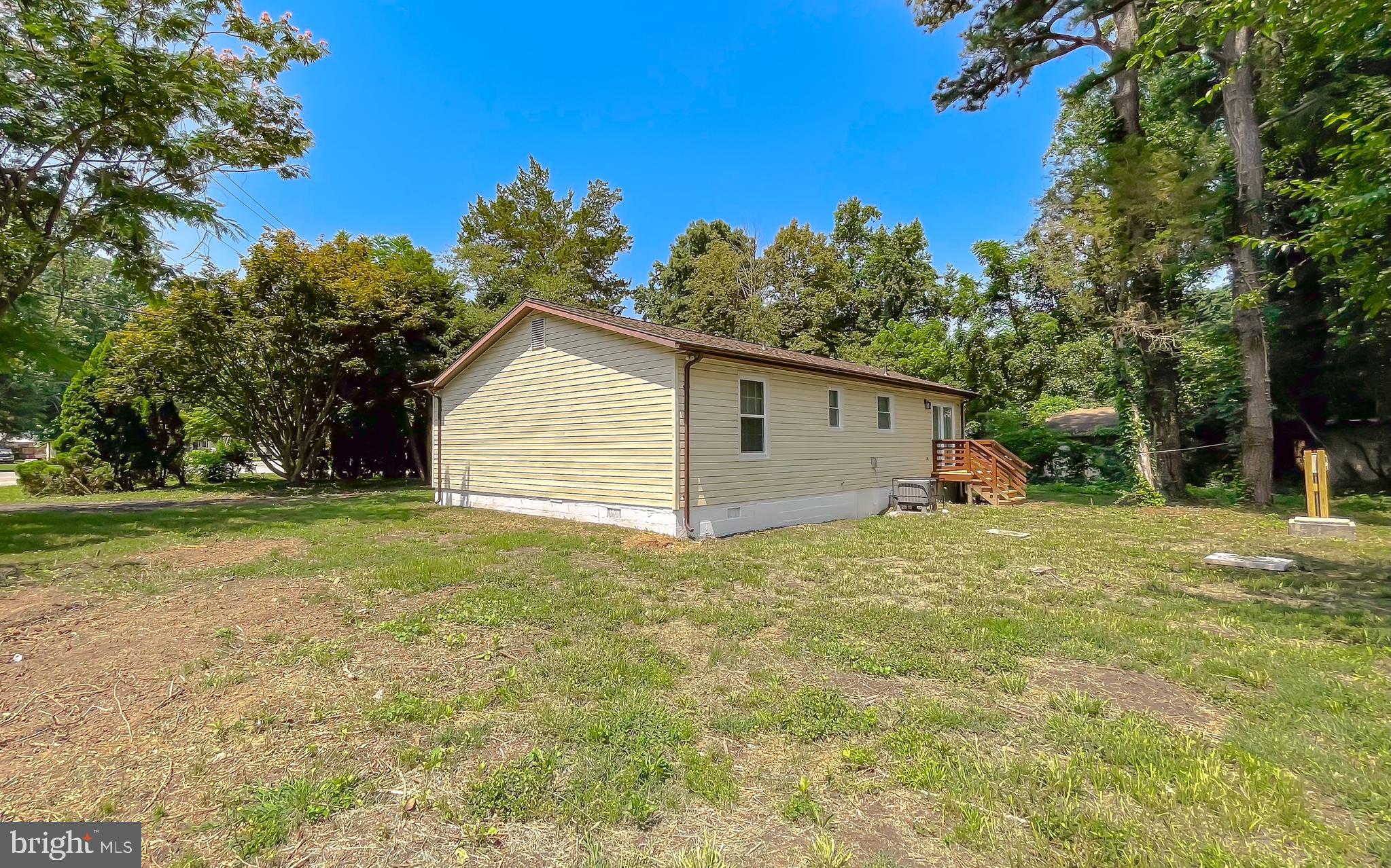 29810 Washington Road Mechanicsville, MD 20659 - Photo 7 of 44 a view of backyard and house