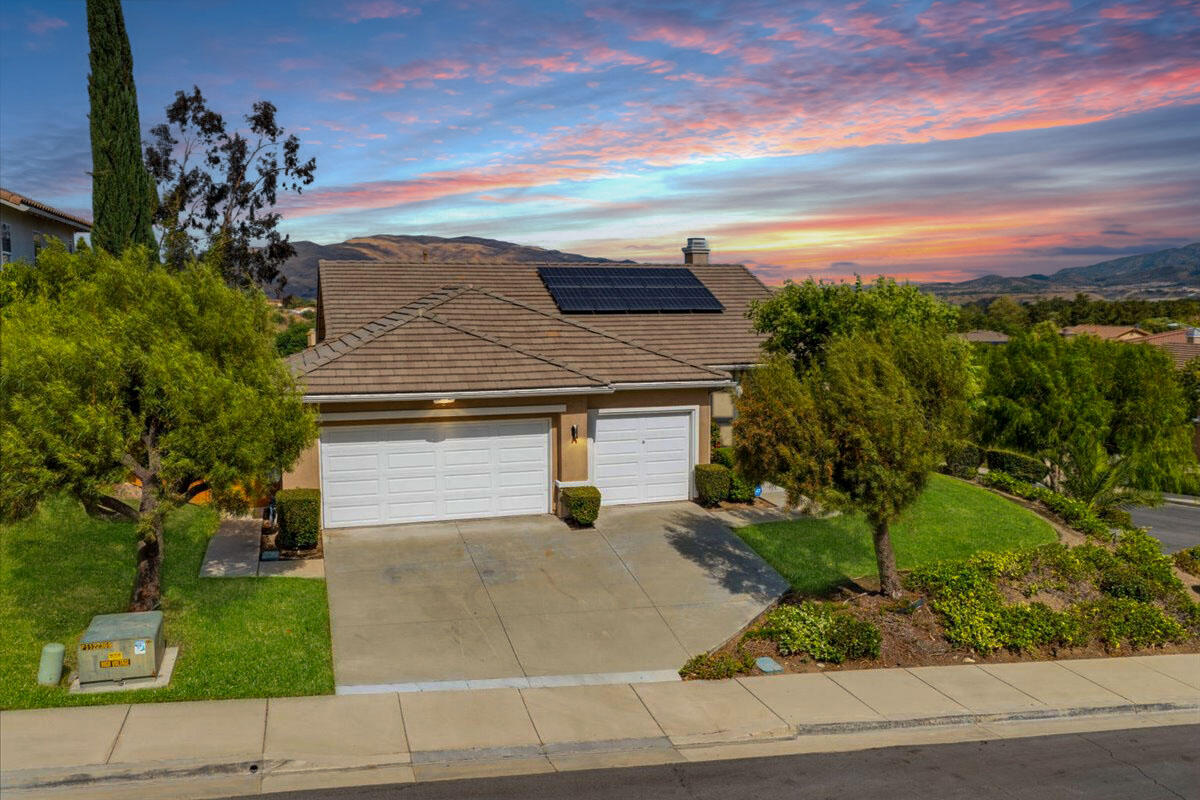 23732 Bella Vista Road Corona, CA 92883 - Photo 2 of 49 a view of a house with a yard