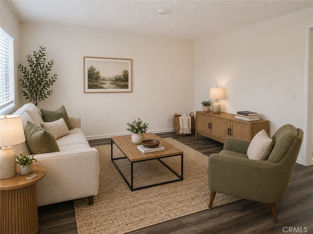 68460 Kings Road, Unit C Cathedral City, CA 92234 - Photo 3 of 18 a living room with furniture and a potted plant