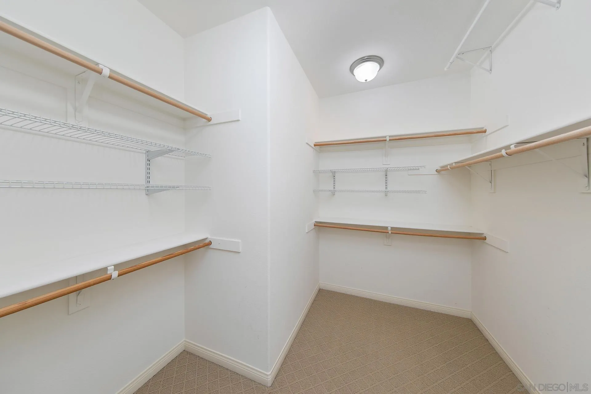624 Ridgemont Circle Escondido, CA 92027 - Photo 41 of 71 a view of an empty walk in closet