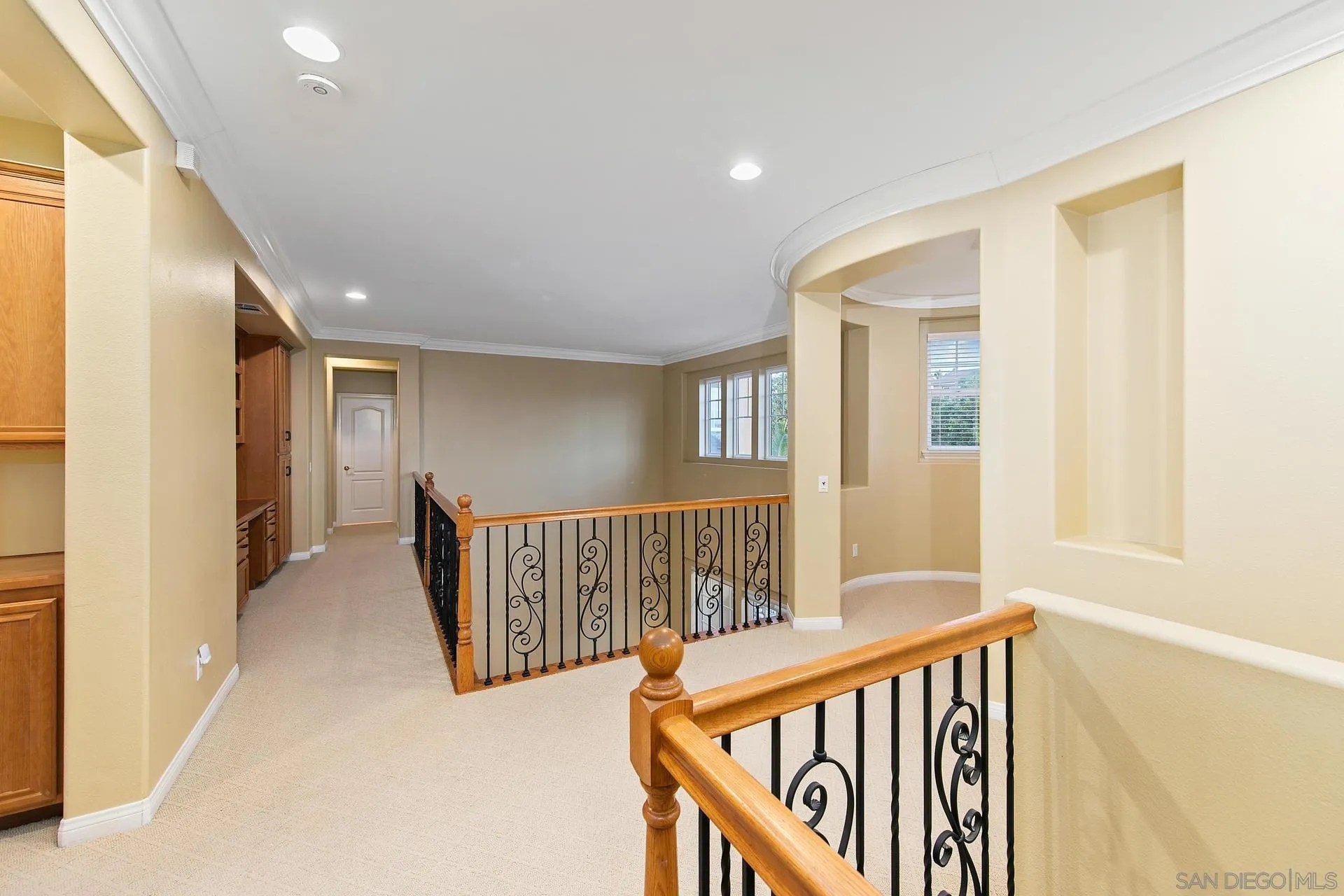 624 Ridgemont Circle Escondido, CA 92027 - Photo 55 of 71 a view of a hallway with windows and stairs