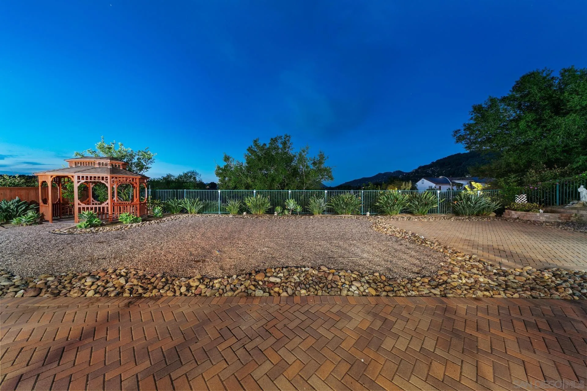 624 Ridgemont Circle Escondido, CA 92027 - Photo 6 of 71 a front view of a house with a yard