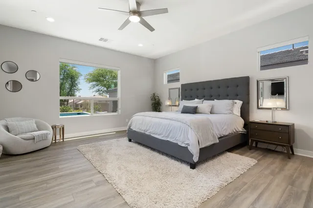 a view of a pathway along with potted plants
