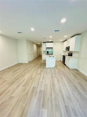 a large room with wooden floor