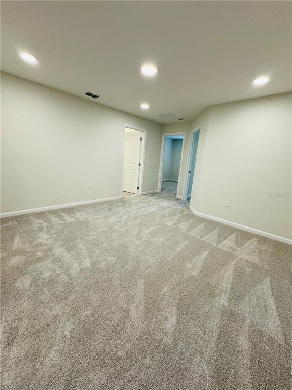 4906 Livingston Lane Oviedo, FL 32765 - Photo 15 of 25 an empty room with an entryway