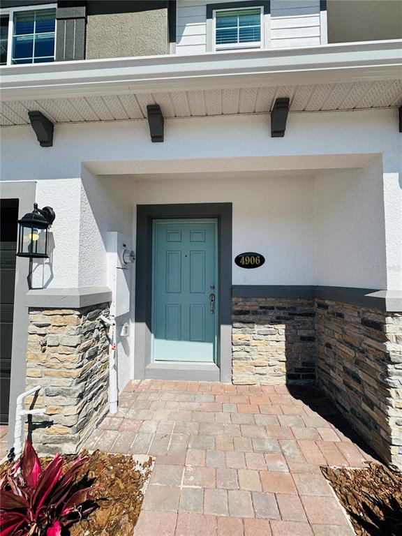 4906 Livingston Lane Oviedo, FL 32765 - Photo 3 of 25 a view of a entryway door of the house
