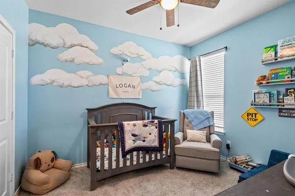 a bedroom with furniture and a bed