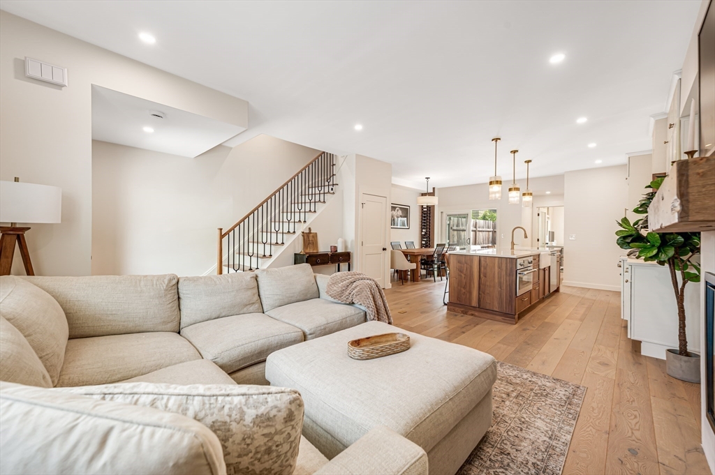 18 Loring Street Boston, MA 02127 - Photo 1 of 27 a living room with furniture and a potted plant