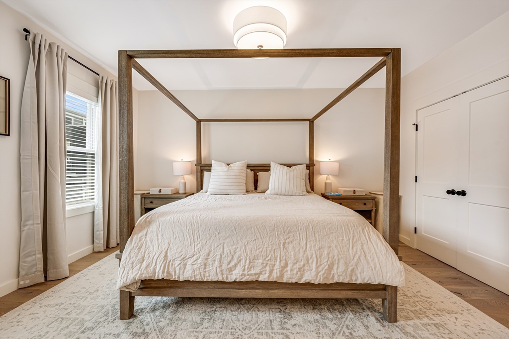 18 Loring Street Boston, MA 02127 - Photo 13 of 27 a bedroom with a bed and a window