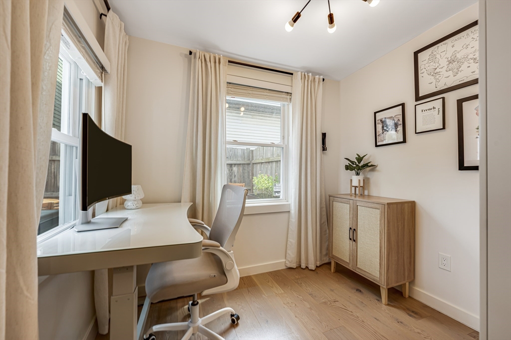 18 Loring Street Boston, MA 02127 - Photo 19 of 27 a view of a workspace with furniture and a window