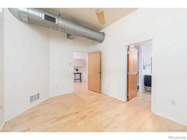 a view of empty room with closet