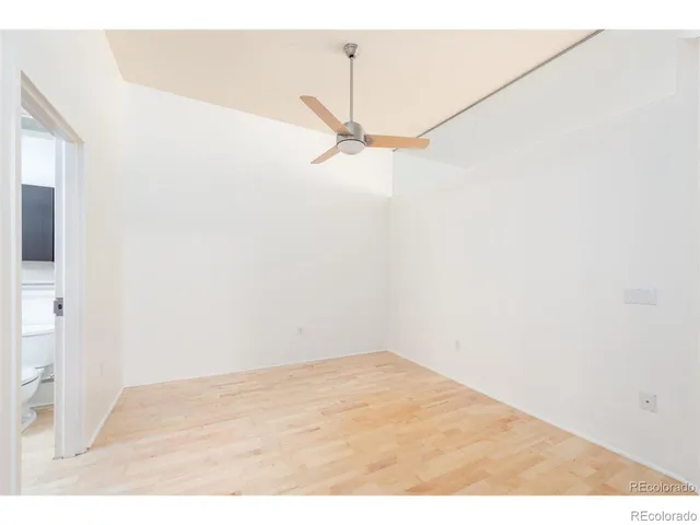 a view of empty room with fan