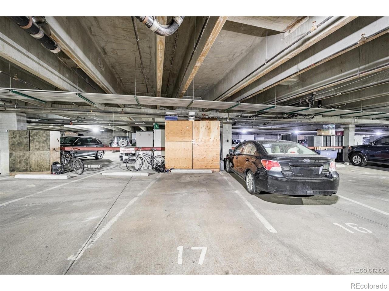 3100 Huron Street, Unit 3P Denver, CO 80202 - Photo 33 of 34 a view of parking garage with cars
