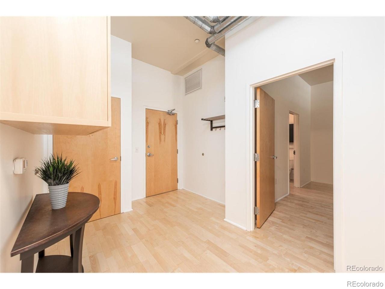 3100 Huron Street, Unit 3P Denver, CO 80202 - Photo 4 of 34 a view interior of the house and wooden floor