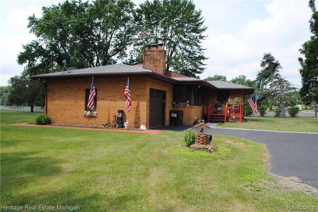 Side view of home - notice the all-brick exterior!