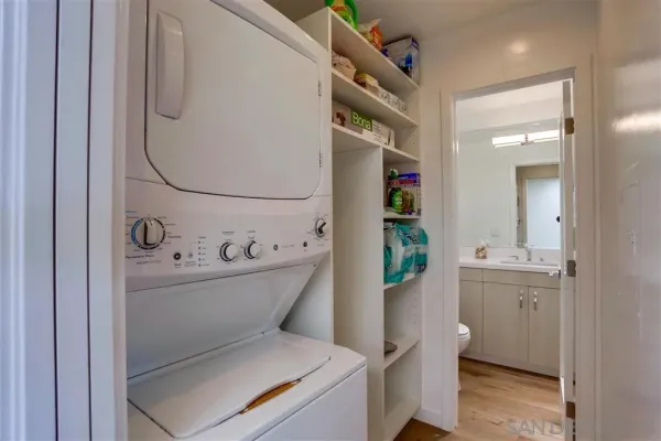 a bathroom with a sink a mirror and a bathtub