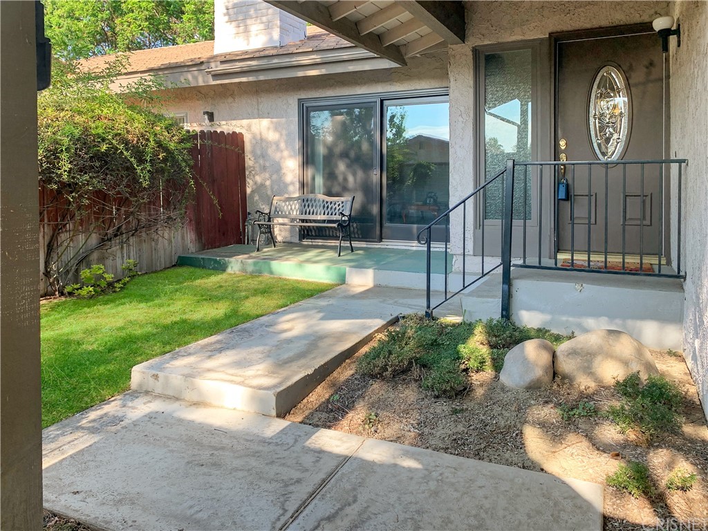 5444 Quince Street Riverside, CA 92506 - Photo 1 of 1 a view of a porch with a table and a potted plant