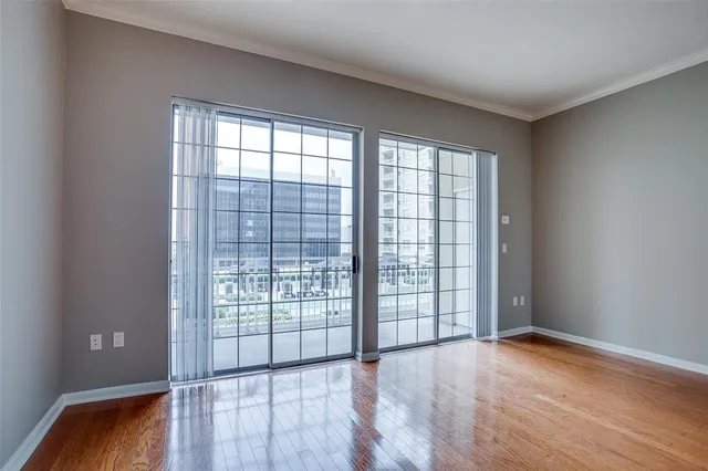 wooden floor and windows in an empty room
