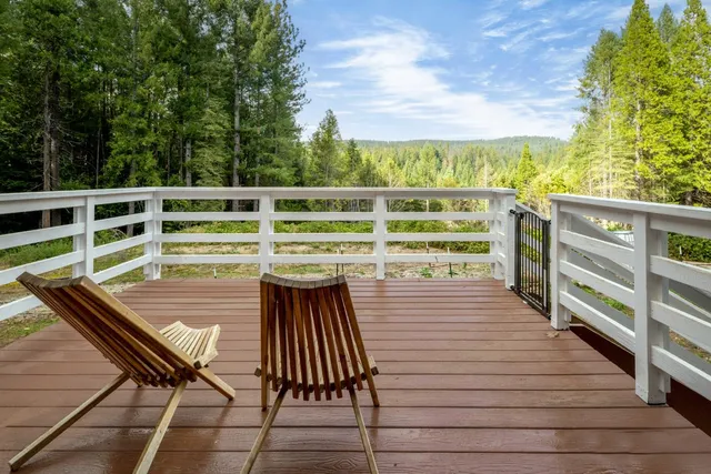 a view of a kitchen with furniture and a table