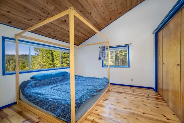 a bathroom with a sink a mirror and vanity