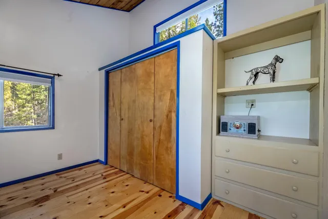 a room with pool table and flat screen tv