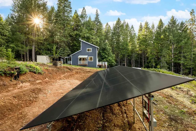 a view of outdoor space with garden and seating