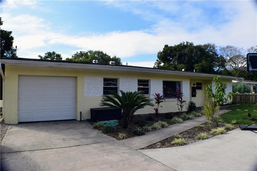514 Oranole Road Maitland, FL 32751 - Photo 1 of 1 a view of a house with backyard and sitting area