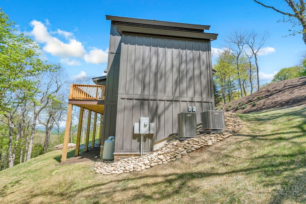 536 Boone Ridge Lane Boone, NC 28607 - Photo 46 of 50 a view of a house with a door and wooden fence